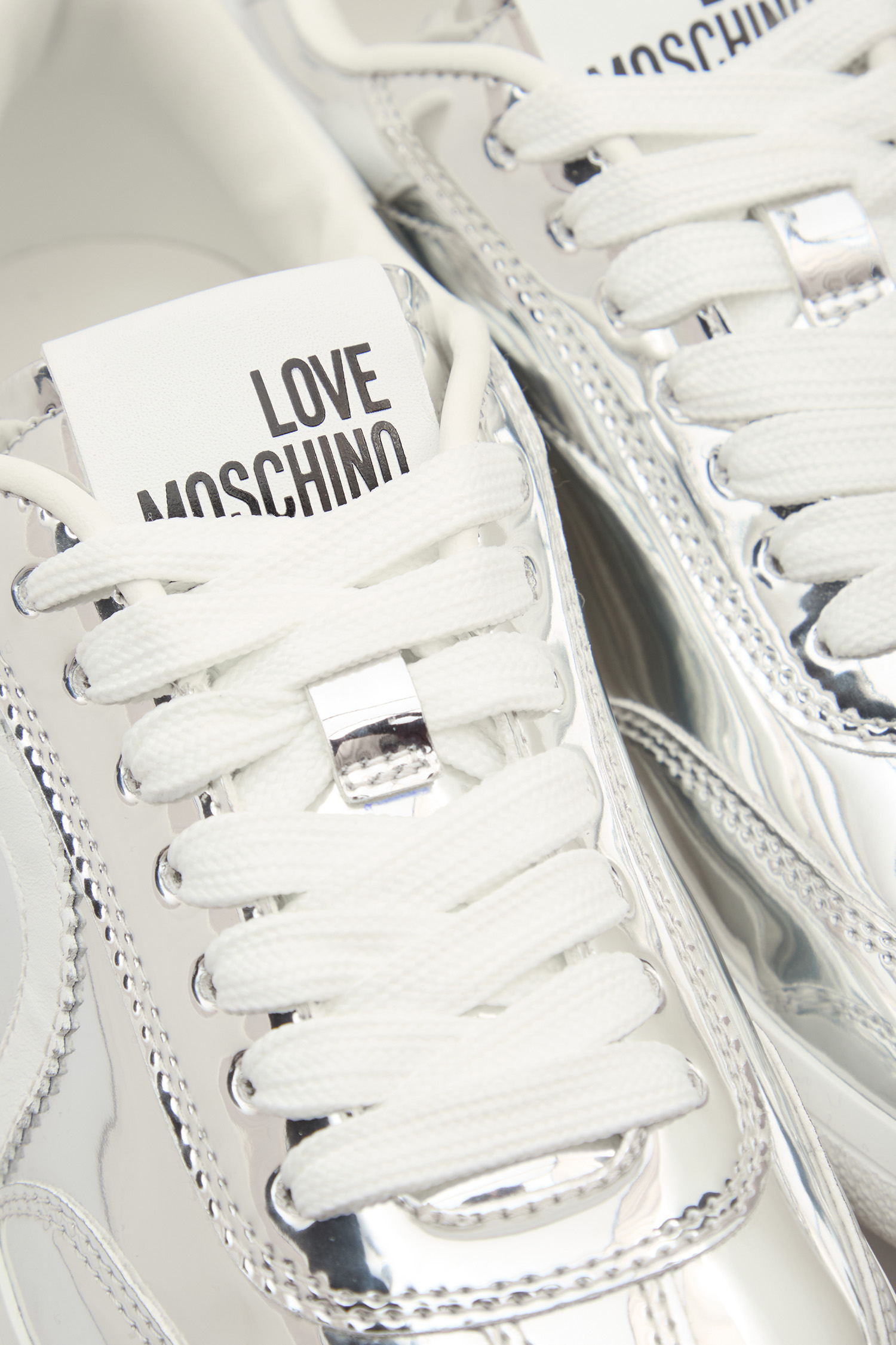 Жіночі сріблясті снікерси Moschino JA15112G1O.JE0;902