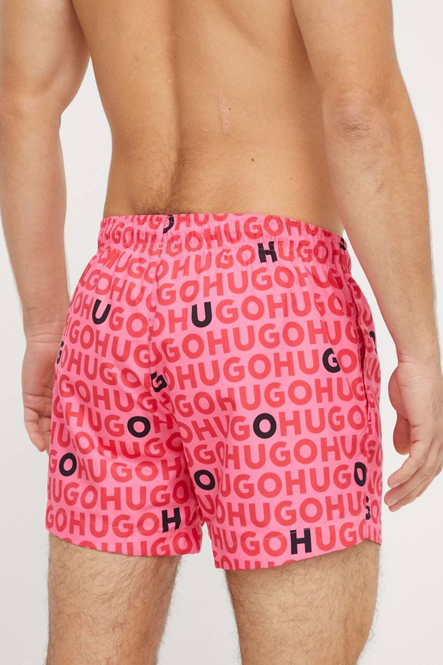 Мужские розовые плавательные шорты с узором HUGO 50474322;660