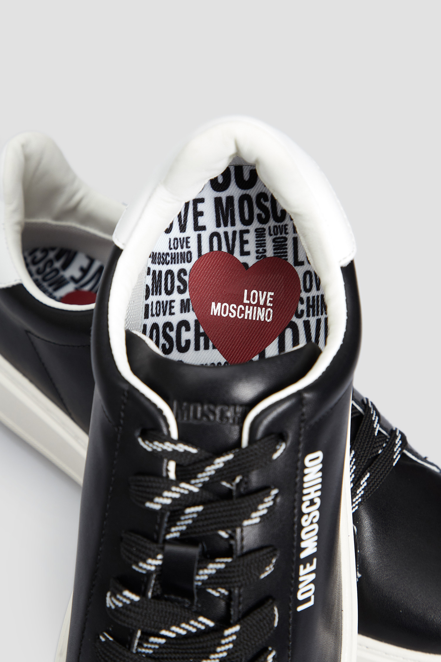 Женские черные кожаные сникерсы Moschino JA15374G0H.IA1;00A