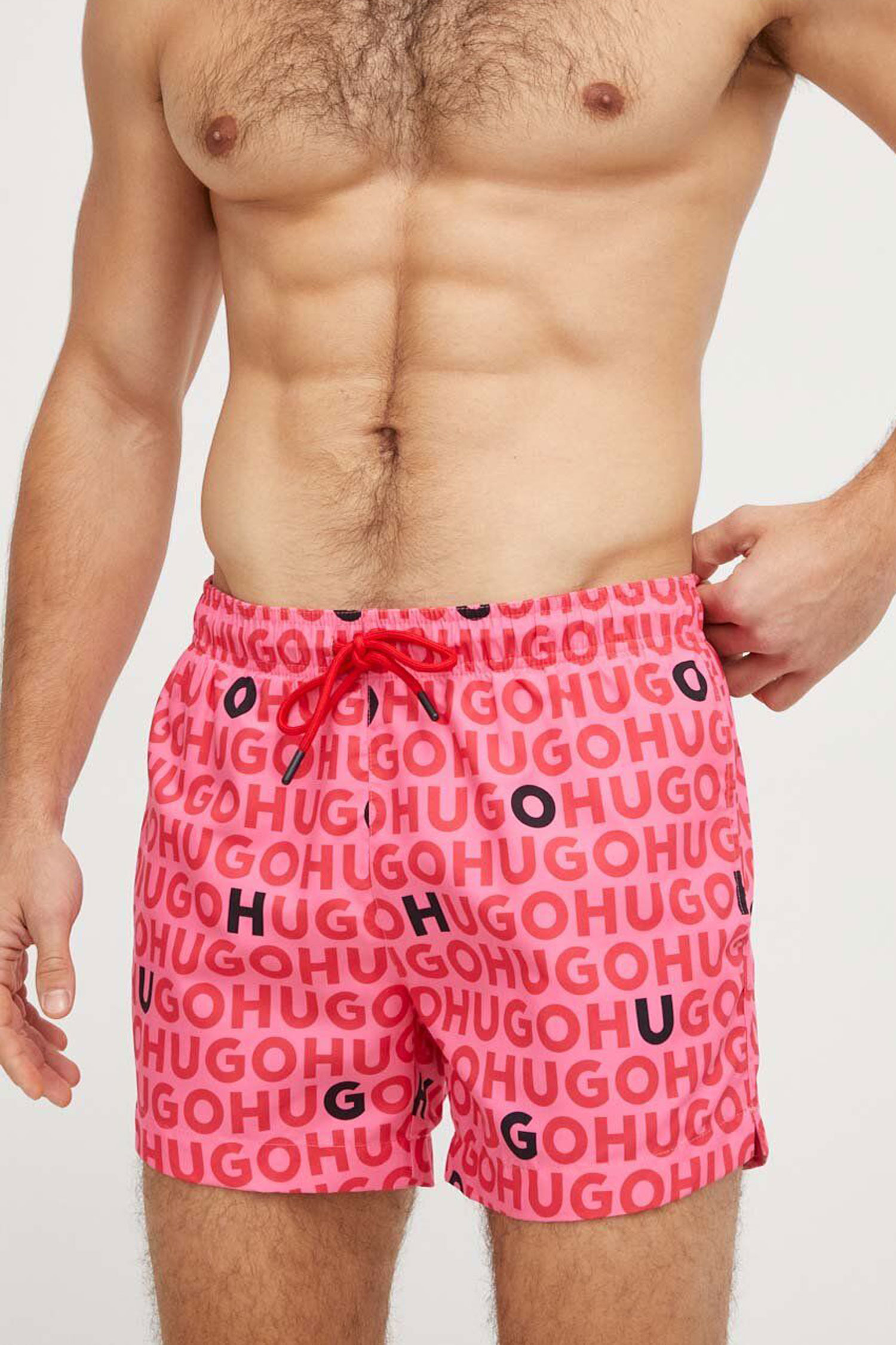 Мужские розовые плавательные шорты с узором HUGO 50474322;660