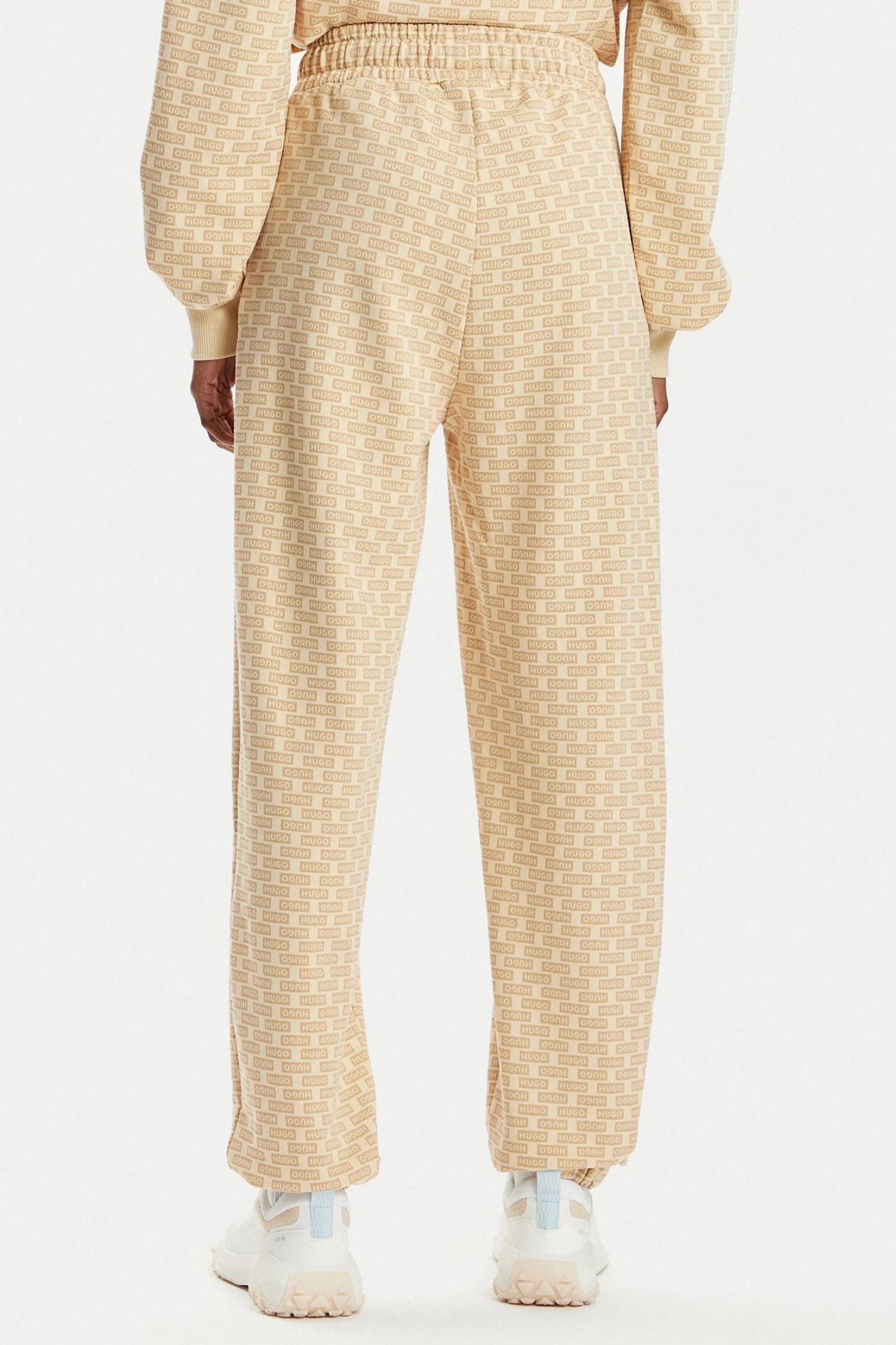 Женские бежевые спортивные брюки с узором HUGO BLUE 50510868;977