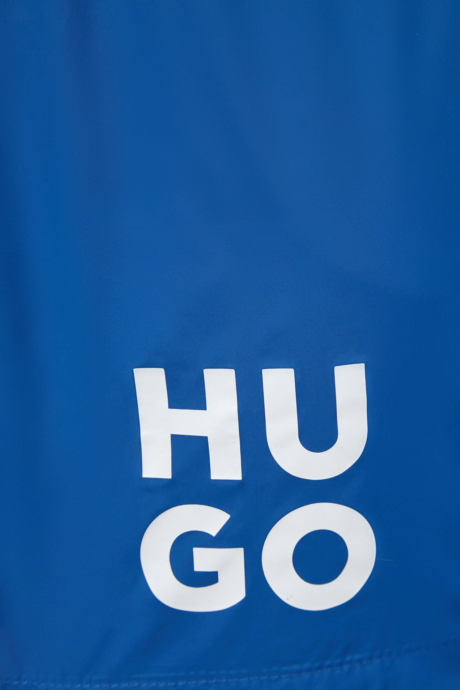 Мужские синие плавательные шорты HUGO 50510190;420