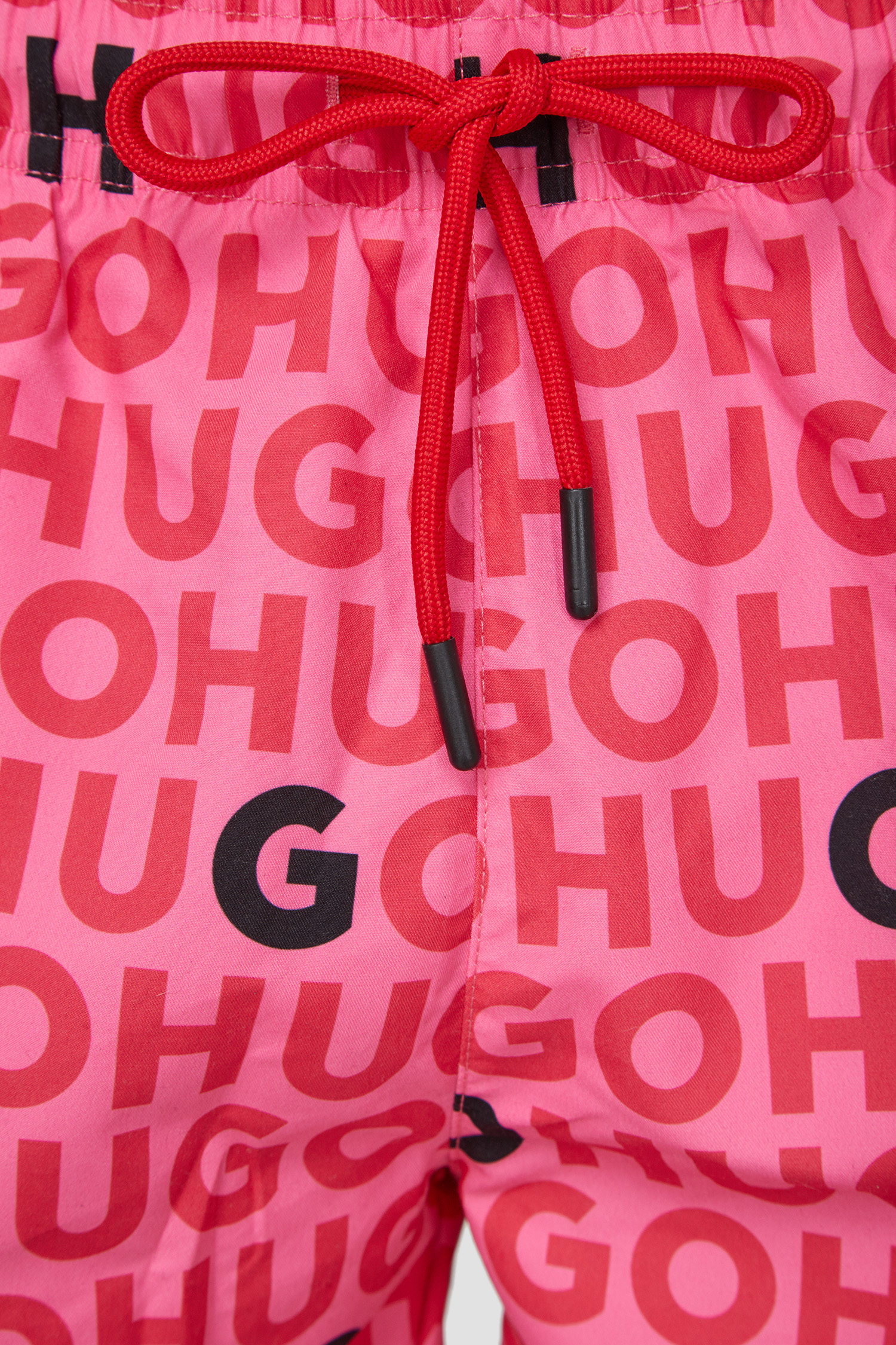 Мужские розовые плавательные шорты с узором HUGO 50474322;660