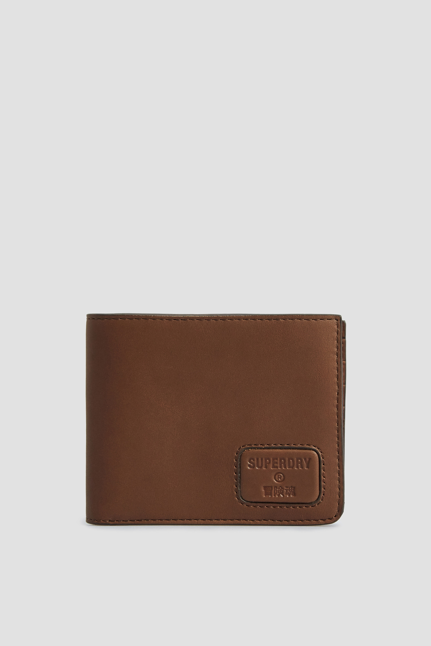 Коричневий шкіряний гаманець для хлопців SuperDry M9810144A;04O