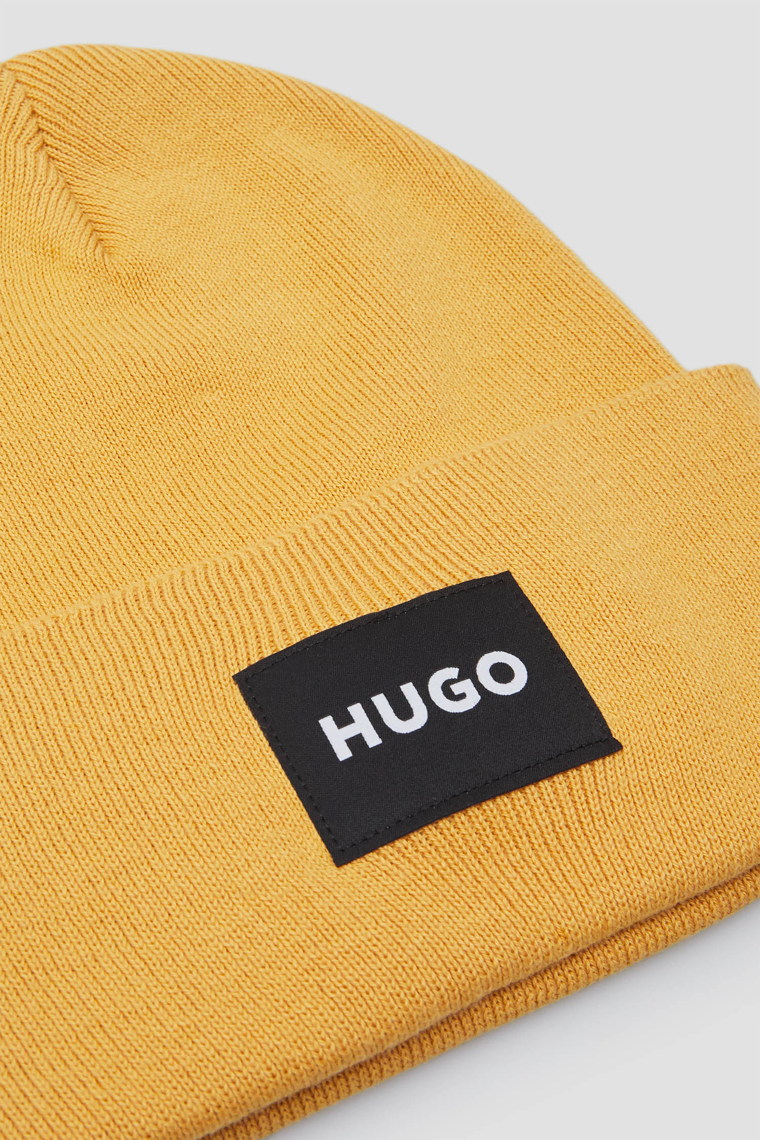 Мужская желтая шапка HUGO 50521527;712