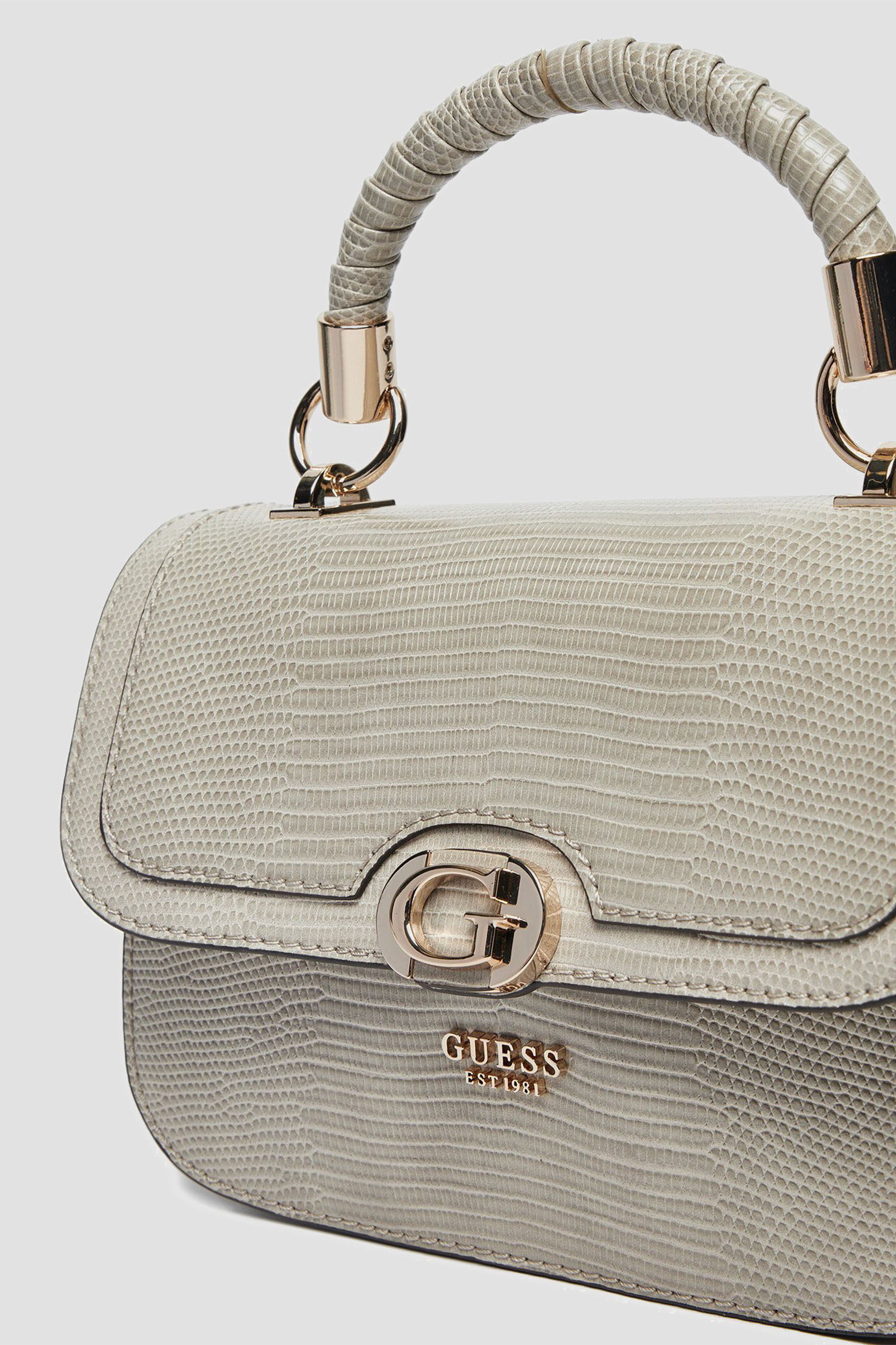 Жіноча бежева сумка Guess HWKG95.31200;TAU