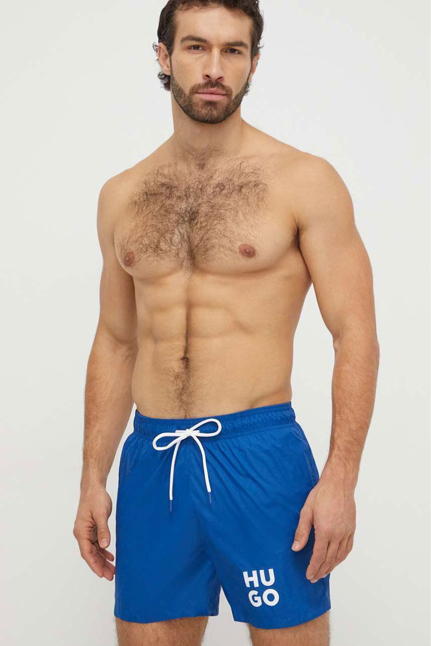 Мужские синие плавательные шорты HUGO 50510190;420