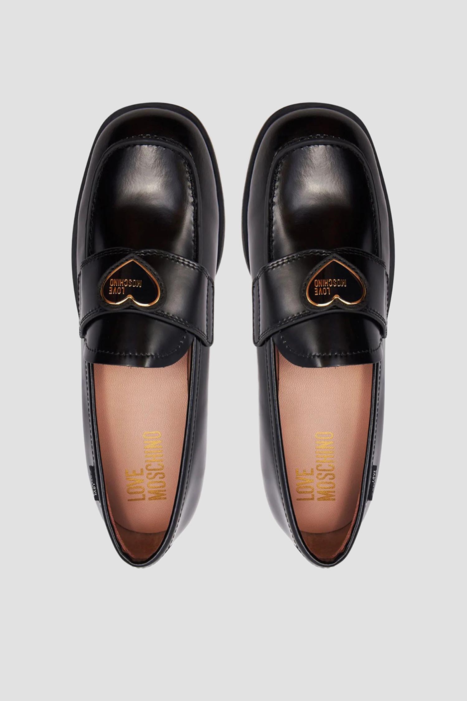 Женские черные кожаные лоферы Moschino JA10172G1I.JD0;000