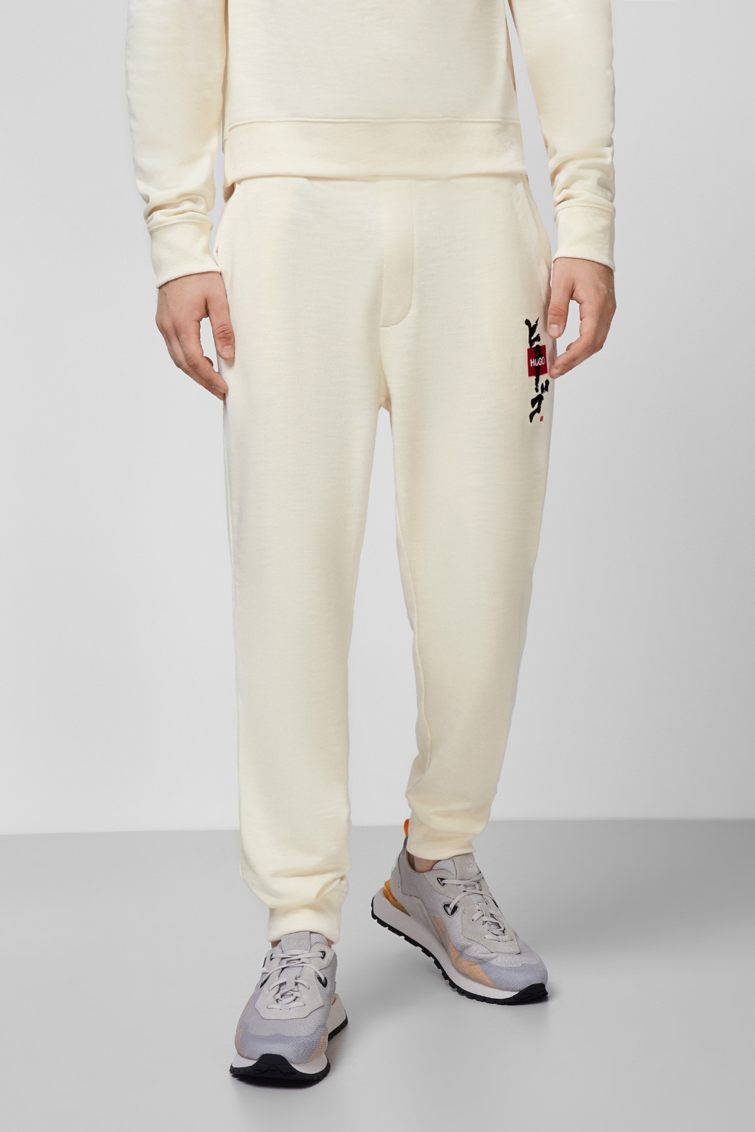 Білі спортивні штани для хлопців HUGO 50448389;107
