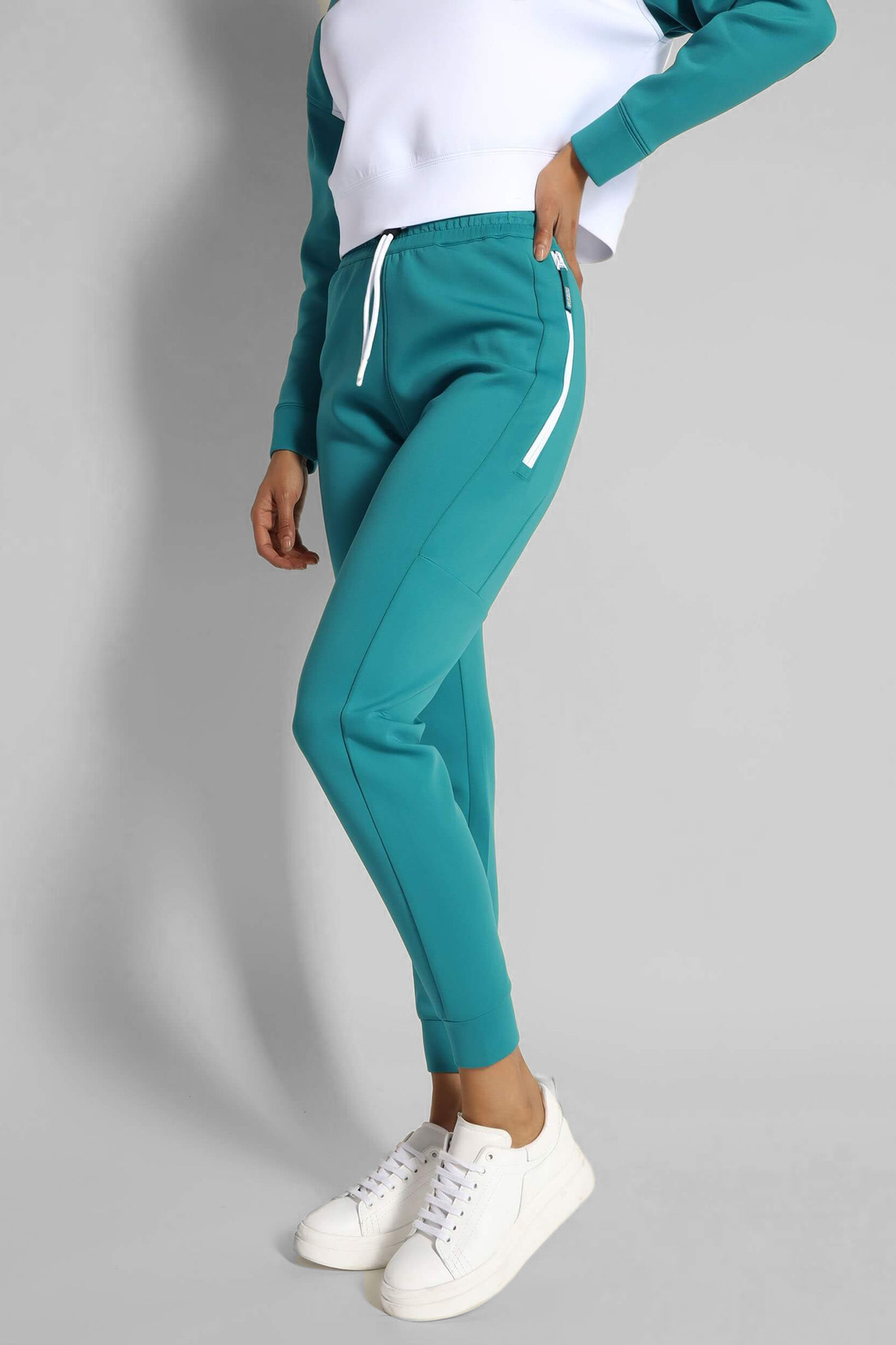 Жіночі бірюзові спортивні штани Guess V2YB11.KB762;G7Y8