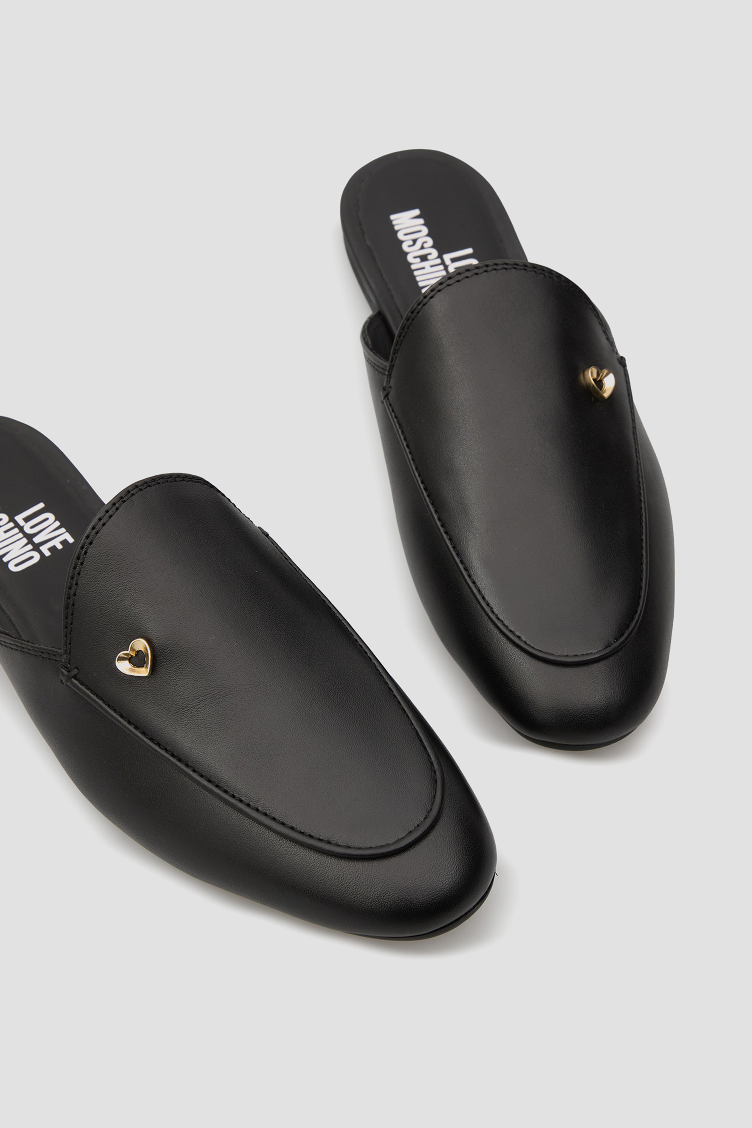 Женские черные кожаные мюли Moschino JA10021G1O.IE0;000