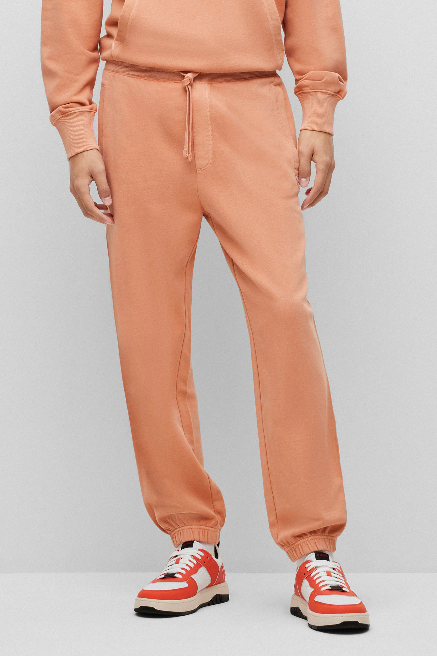 Мужские персиковые спортивные брюки HUGO 50486467;899