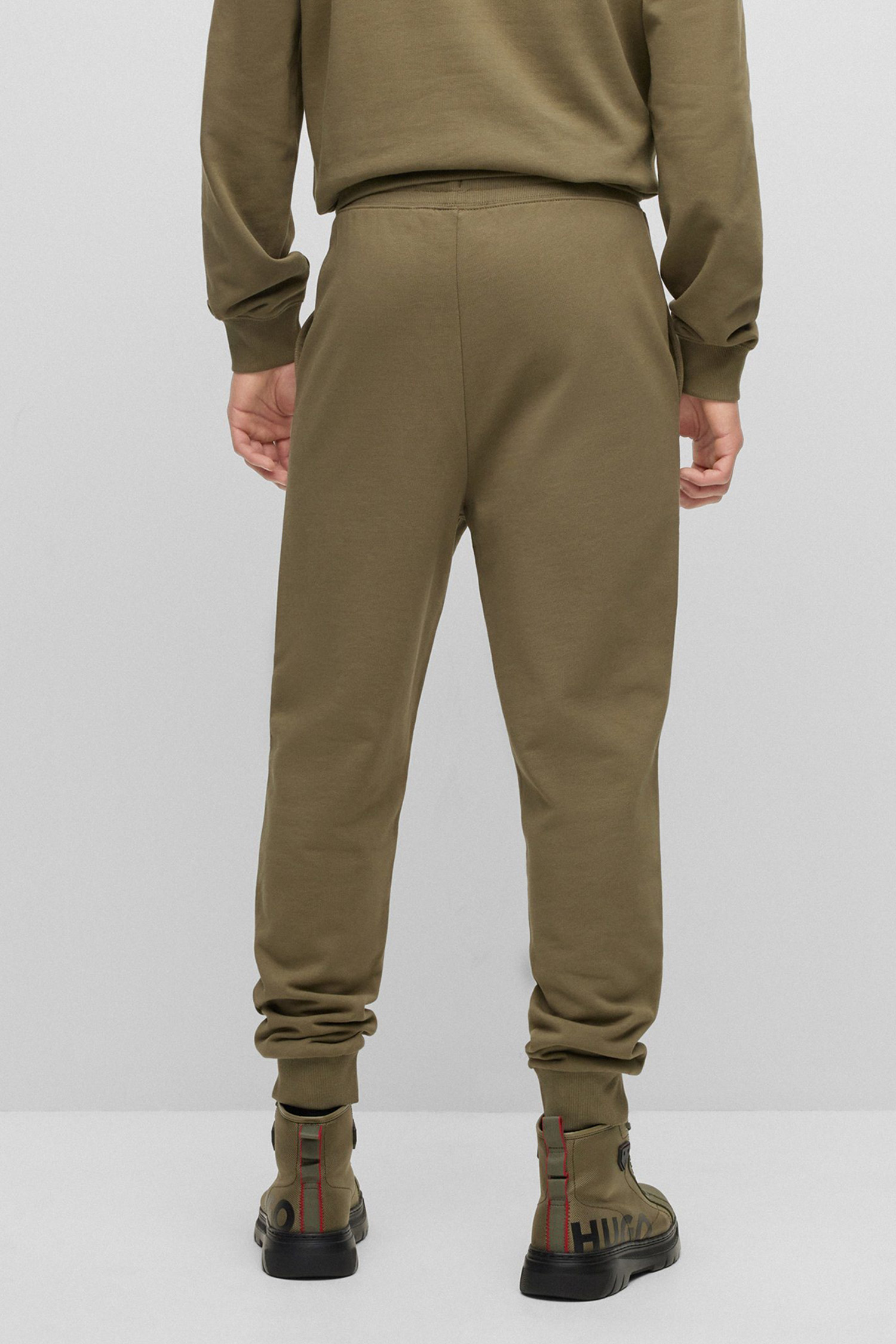 Мужские оливковые спортивные брюки HUGO 50489617;345