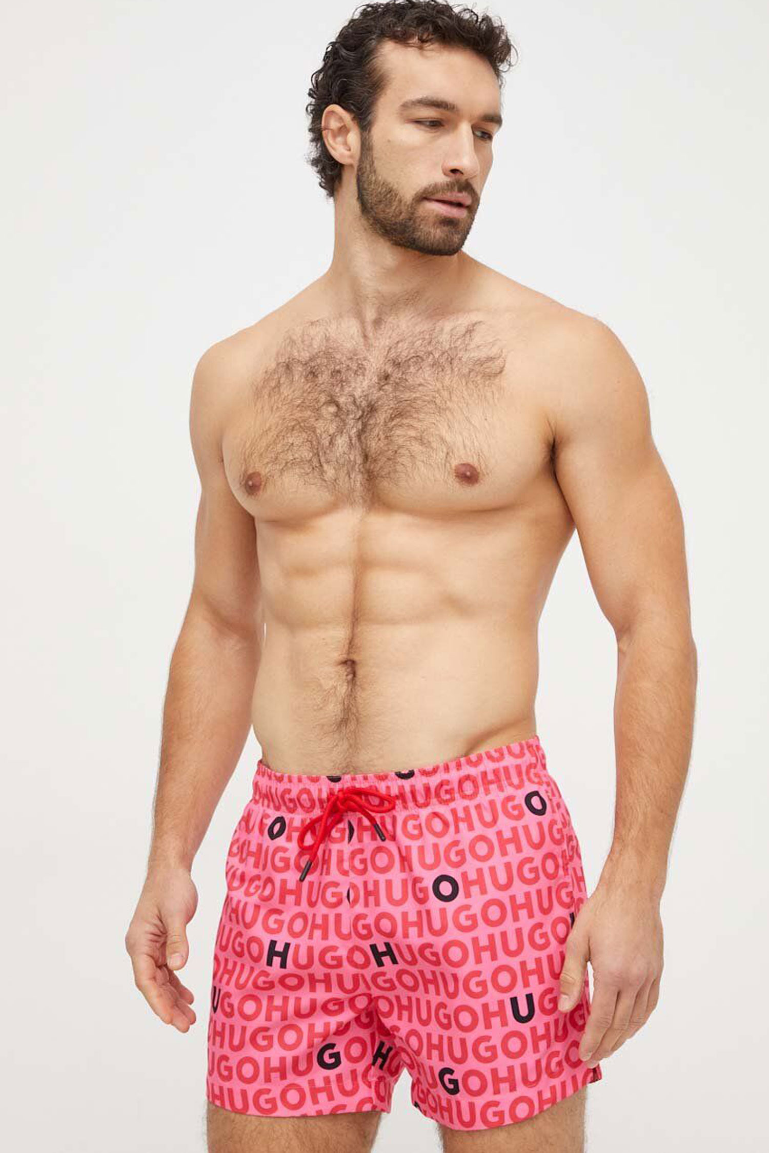 Мужские розовые плавательные шорты с узором HUGO 50474322;660