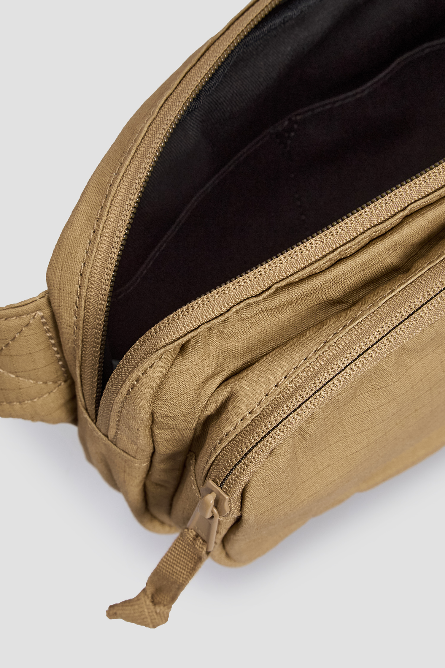 Бежевая поясная сумка Levi’s® 235270;634.37